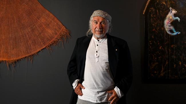 Djon Mundine says white staff painting over Indigenous art is ‘immoral’ and a ‘sin’.