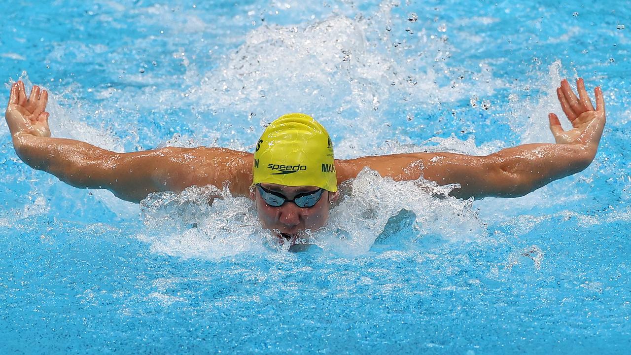 Will Martin destroys the field in the Class 9 100m butterfly.