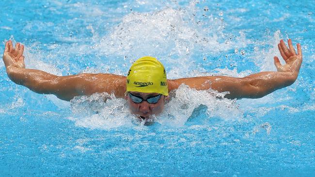 Will Martin destroys the field in the Class 9 100m butterfly.