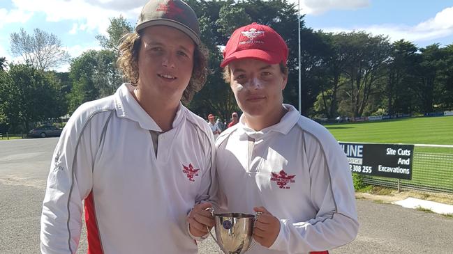 Jarryd and Riley Vernon celebrate Gisborne's McIntyre Cup premiership. Picture: Tim Michell