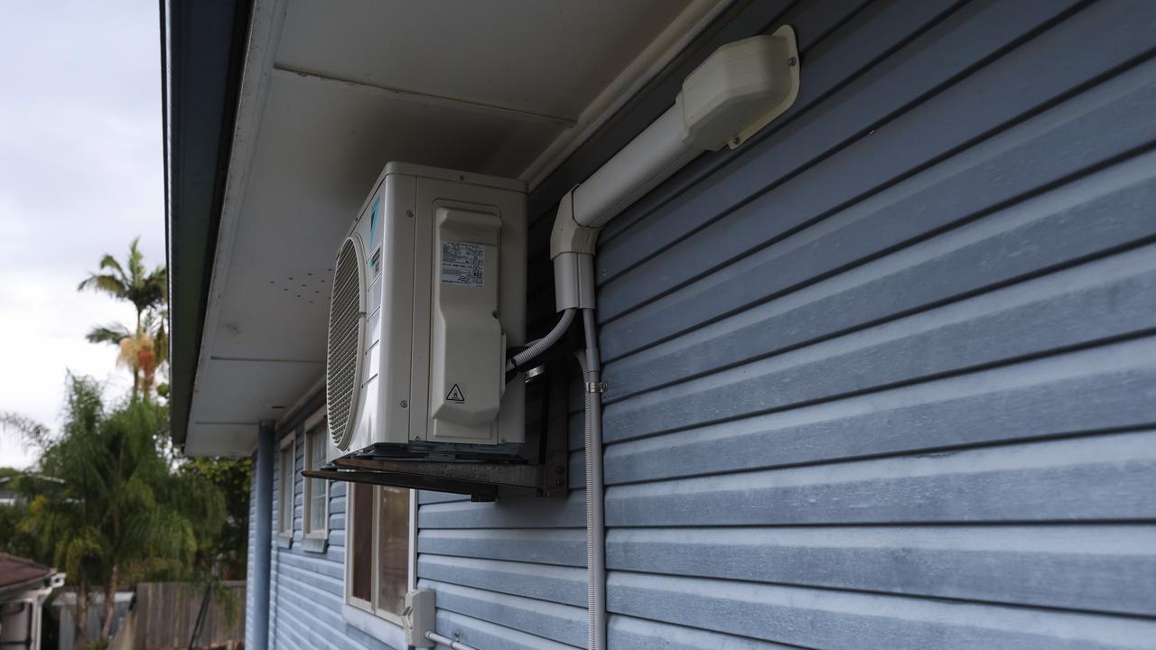 Brisbane homeowner Shane McNamara raised airconditioning units after the 2022 floods. Picture: Adam Head