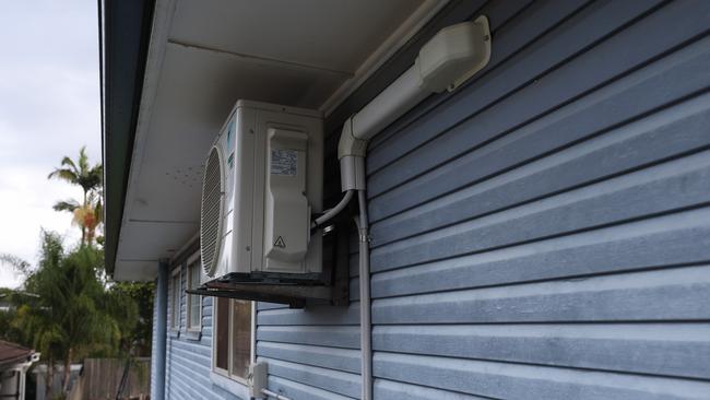 Brisbane homeowner Shane McNamara raised airconditioning units after the 2022 floods. Picture: Adam Head