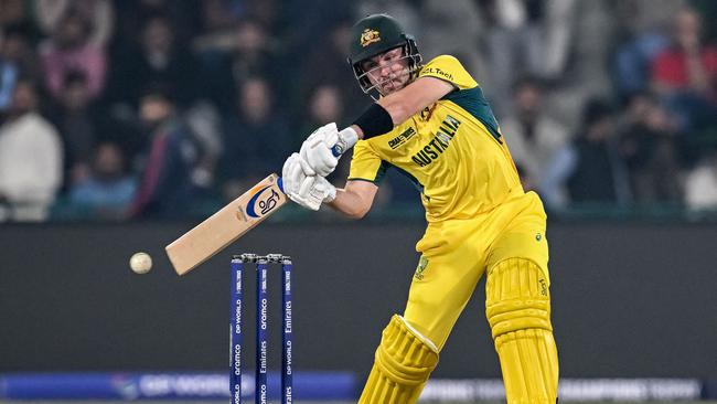 TOPSHOT - Australia's Josh Inglis plays a shot during the ICC Champions Trophy one-day international (ODI) cricket match between Australia and England at the Gaddafi Stadium in Lahore on February 22, 2025. (Photo by Aamir QURESHI / AFP)