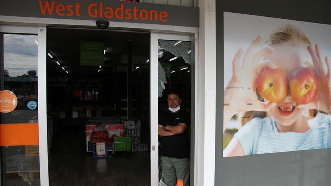 Manager Zafar Aziz shows the damage where a thief smashed into West Gladstone Foodworks just after 4am on April 11. Picture: Rodney Stevens