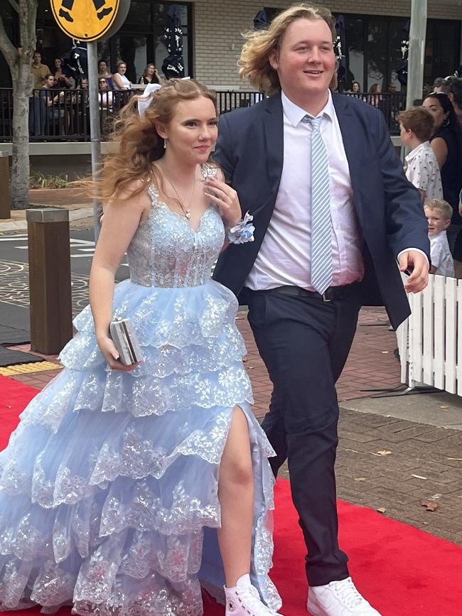 Isabelle McGlinn and Corbin Davidson arrive at the Urangan State High School formal.