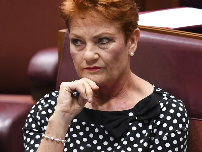 One Nation leader Pauline Hanson reacts during debate of the Welfare Reform Bill in the Senate chamber at Parliament House in Canberra, Wednesday, March 21, 2018. (AAP Image/Lukas Coch) NO ARCHIVING