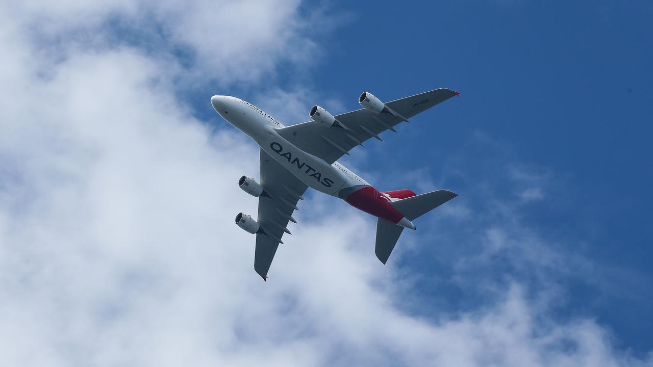 A Qantas A380 returns to the skies and flies in over Sydney Harbour. Picture: NCA Newswire / Gaye Gerard