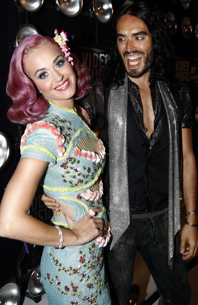 Russell Brand, right, ended his 14-month marriage to Katy Perry via text in December 2011. Picture: AP