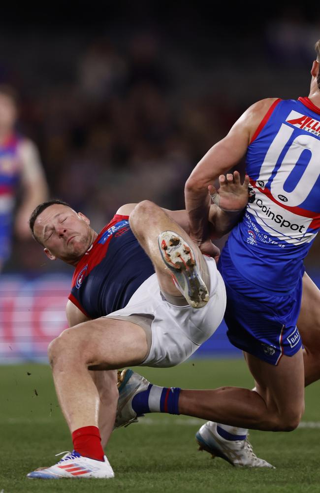 Steven May has been cleared of serious injury after this hit on Friday night. (Photo by Darrian Traynor/Getty Images)