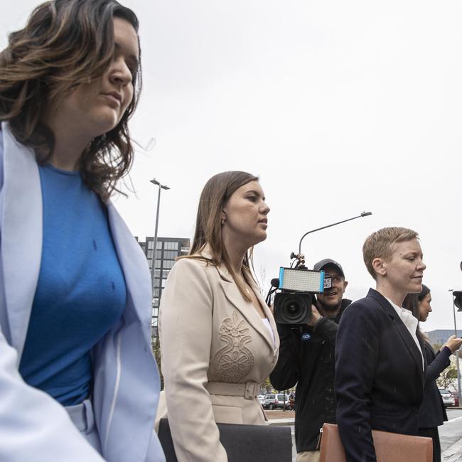 Brittany Higgins, centre, says Bruce Lehrmann tried to kiss her after a work dinner with colleagues at the Kingston Hotel. Picture: Gary Ramage