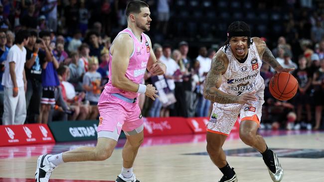 Rob Edwards of the Cairns Taipans (R) defended by Matthew Mooney of the Breakers during the round 19 NBL match between New Zealand Breakers and Cairns Taipans at Spark Arena, on February 01, 2025, in Auckland, New Zealand. (Photo by Fiona Goodall/Getty Images)