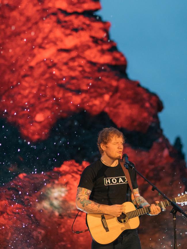 Ed Sheeran strummed in the rain at Hanging Rock, Macedon, on Sunday. Picture: Jaden Oswald