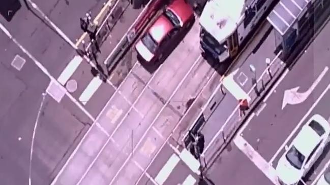 The Footage from the police airwing shows Dimitrious Gargasoulas close passing cars and driving on tram lines before doing burnouts at the intersection of Bourke and Flinders street.