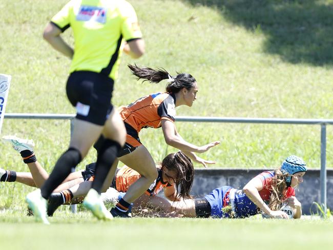 Lacey Mitchell touches down for the try. Picture: Michael Gorton