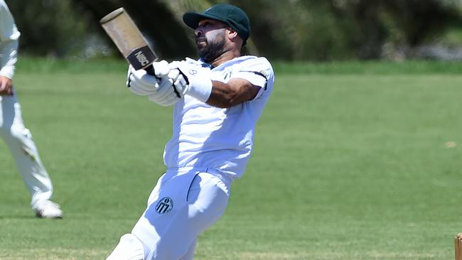 Sunny Taggar launches a ball to the fence for Craigieburn.