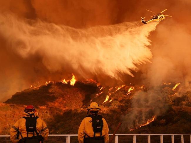 Sprawling L.A. Fire Expands Overnight, Triggers New Evacuation Orders