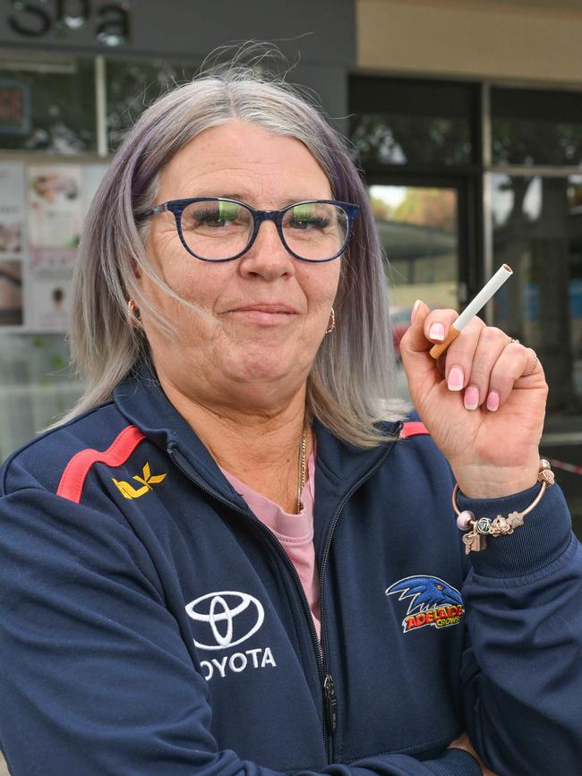 Sharon van Homelen saves hundreds of dollars a months by buying illicit smokes. Picture: Brenton Edwards
