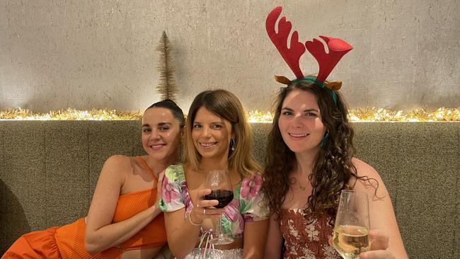 (L-R) Zahra Neis-tzavaras, Amy White and Kate Kenny enjoying Christmas Day at Hilton Darwin, 2022. Picture: Annabel Bowles