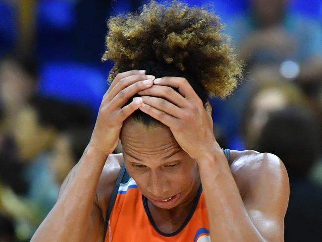 Serena Guthrie of the Giants is seen reacting after the game finished in a draw during the Round 8 Super Netball match between the Sunshine Coast Lightning and the Giants Netball at the University of the Sunshine Coast Sports Stadium in Sippy Downs, Queensland, Saturday, June 23, 2018. (AAP Image/Darren England) NO ARCHIVING, EDITORIAL USE ONLY