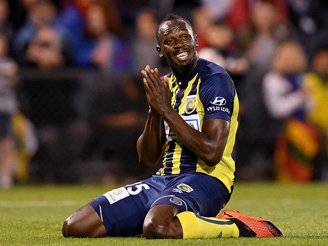 Usain Bolt of the Mariners reacts after missing a shot at goal during a Hyundai A-League trial match between the Central Coast Mariners and Macarthur South West United at Campbelltown Stadium in Sydney, Friday, October 12, 2018. (AAP Image/Dan Himbrechts) NO ARCHIVING, EDITORIAL USE ONLY