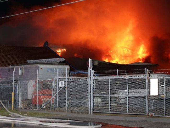 Massive flames at Japanese pervert slumlord Masaaki Imaeda's secret shanty town in 2014. Picture: News Corp.