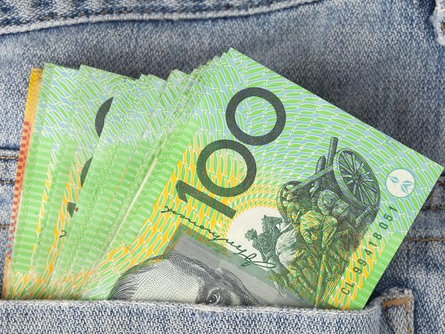 Australian 100 dollar notes in jeans pocket. money, wealthy, rich generic