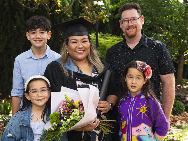 Master of Science graduate Maria Gagarin with son Christian Miller, husband Timothy Miller, daughters Olivia (left) and Sophia Miller at a UniSQ graduation ceremony at The Empire, Wednesday, October 30, 2024. Picture: Kevin Farmer