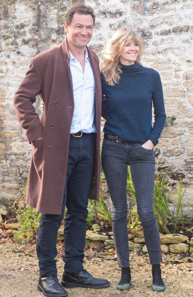 Awkward: Dominic West and wife Catherine FitzGerald make a statement to press outside their Cotswolds home after Dominic was seen kissing actress Lily James whilst in Rome. Picture: GlosPics/ MEGA