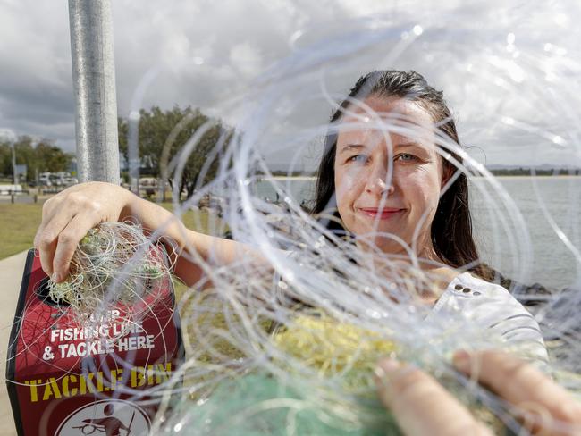 Kellie Lindsay oversees the project of placing tackle bins around popular fishing locations on the Gold Coast to collect used and unwanted fishing tackle and line. Pic Tim Marsden