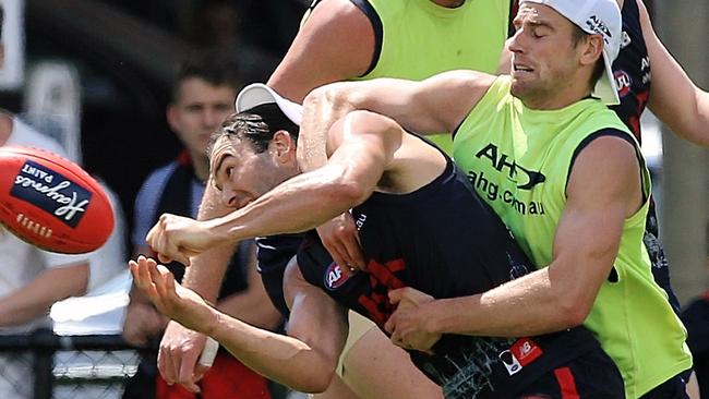 Jordan Lewis is tackled by Dom Tyson. Picture: Wayne Ludbey