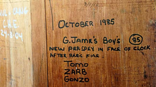 The signatures left by the G. James crew in the clock tower after they replaced the clockface perspex in 1985. Picture: Rob Williams