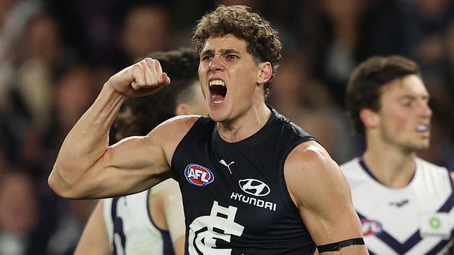 MELBOURNE, AUSTRALIA - JUNE 25: Charlie Curnow of the Blues celebrates after scoring a goal during the round 15 AFL match between the Carlton Blues and the Fremantle Dockers at Marvel Stadium on June 25, 2022 in Melbourne, Australia. (Photo by Robert Cianflone/Getty Images)