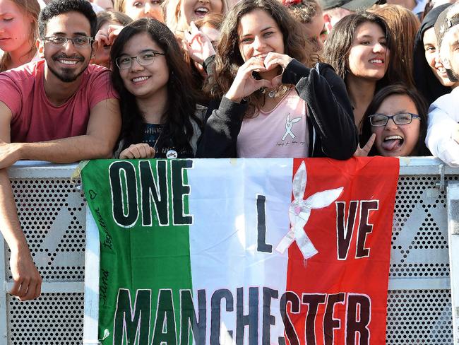 Music fans gather at the One Love Manchester benefit concert. Picture: AFP