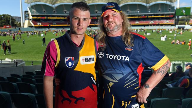 Brandon Williss, 20, and father, Stephen Williss, 47, from Renmark, were among those at Adelaide Oval. Brandon lost a bet and had to shave his head like Richmond player Dustin Martin. Picture: Tom Huntley