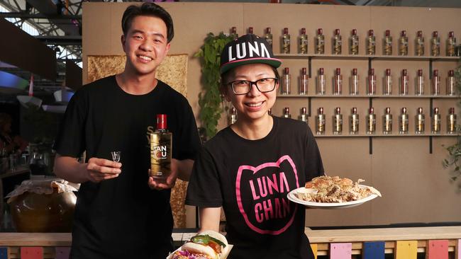 Tim Ye of Sanyou Tasmanian Baijiu stall with Sunsun Zeng of Luna Chan stall. Tasmania's Taste of Summer opening day. Picture: Nikki Davis-Jones