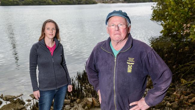 Marine Biologist Dr Mike Bossley with whale and dolphin conservation volunteer Marianna Boorman by the Port River on Garden Island. Picture: Brenton Edwards