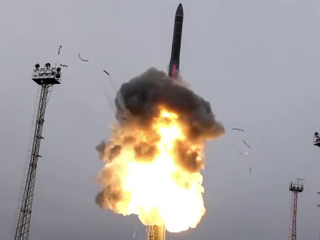 In this photo taken from undated footage distributed by Russian Defense Ministry Press Service, an intercontinental ballistic missile lifts off from a truck-mounted launcher somewhere in Russia. The Russian military said the Avangard hypersonic weapon entered combat duty on Friday. The Kremlin has made modernization of Russia's strategic nuclear forces one of its top priorities. (Russian Defense Ministry Press Service via AP)