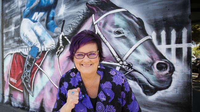 Winx co-owner Debbie Kepitis at the mural of Winx in Ascot Vale.