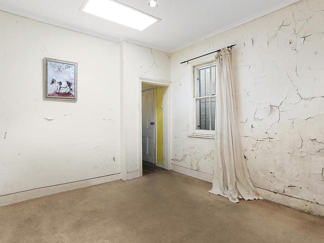 It is listed for up to six-figures even though its walls are peeling. Picture: McGrath/realestate.com.au