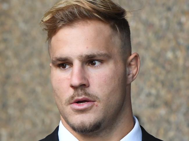 NRL player Jack De Belin arrives at the NSW Federal Court in Sydney, Thursday, April 18, 2019. Jack de Belin is suing the NRL and ARL Commission after he was indefinitely suspended under the game's crackdown on misbehaviour. (AAP Image/Peter Rae) NO ARCHIVING