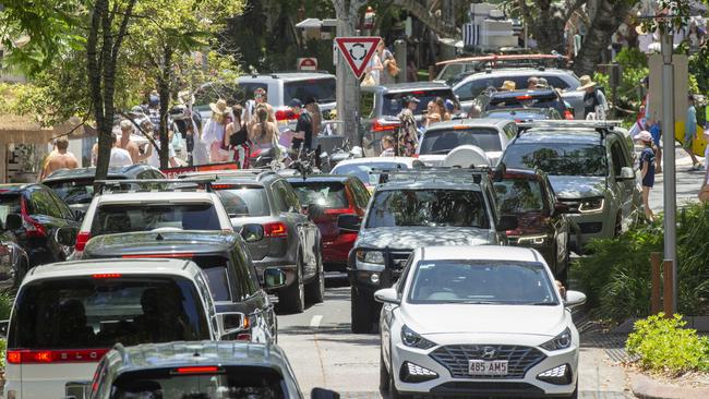 Holiday traffic jam on Hastings street in Noosa as crowds pack in to the popular tourist town. Picture: Lachie Millard