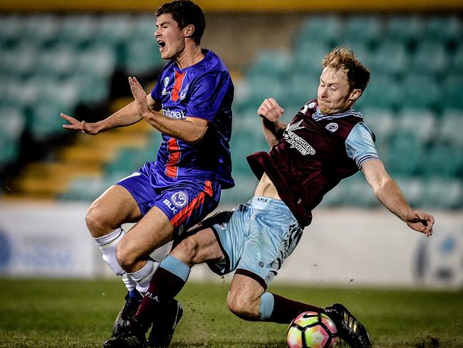 APIA Leichhardt’s Nathan Milgate tackles Manly United’s Dominic Ferguson during last weekend’s NSW Premier League grand final.