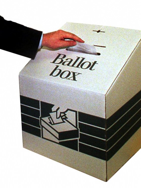 04/05/2004 PIRATE: Generic image of man voter placing vote in ballot box for election May 2004.