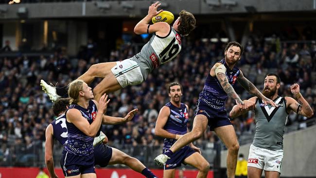 Mitch Georgiades flies for an incredible mark against Fremantle at Optus Stadium. Picture: Daniel Carson/AFL Photos via Getty Images