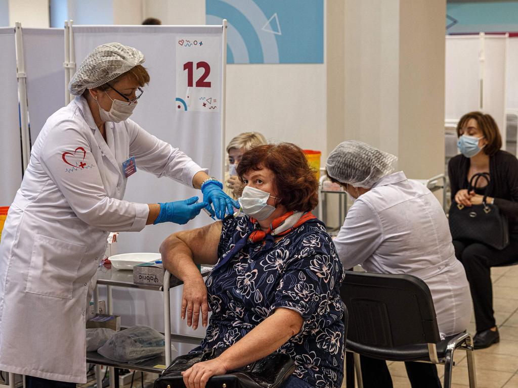 A healthcare worker administers a dose of Russia's Sputnik V Covid-19 vaccine in Moscow. Picture: AFP