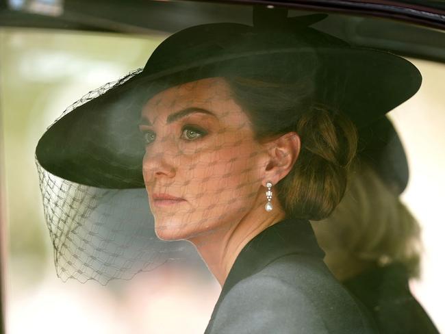 TOPSHOT - Britain's Catherine, Princess of Wales, sits in a car during the State Funeral Service for Britain's Queen Elizabeth II in London on September 19, 2022. (Photo by Mike Egerton / POOL / AFP)