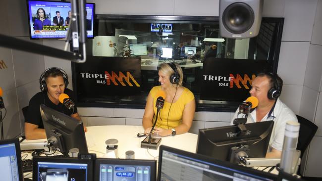 Ben "Dobbo" Dobbin, Libby Trickett and Luke Bradnam at the Triple M studios before it was cancelled. Pic Mark Cranitch.