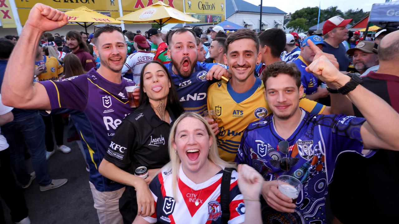 Magic Round revellers Tyson Murray, Kiarn Moeke, Zac Hayward, Jess Clarke (front), Jacob Andrews and Carmine Barone on Caxton St. Picture: Steve Pohlner