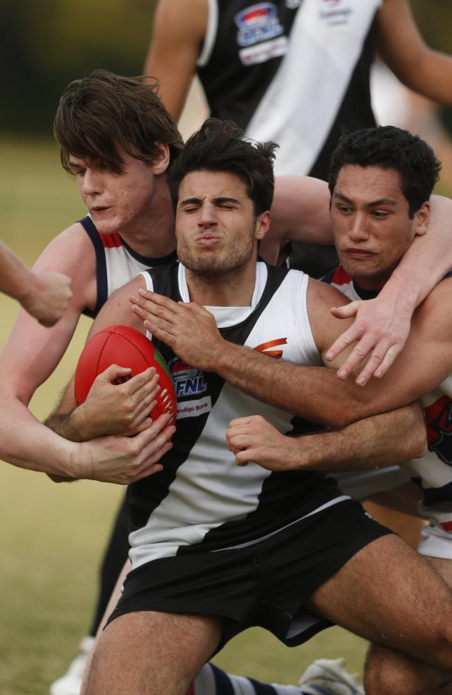 The Oaks’ Frank Bonacci fights for the ball.