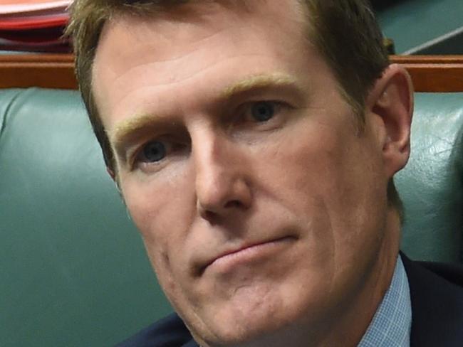 Australia's Social Services Minister Christian Porter reacts during House of Representatives Question Time at Parliament House in Canberra, Tuesday, Nov. 29, 2016. (AAP Image/Lukas Coch) NO ARCHIVING